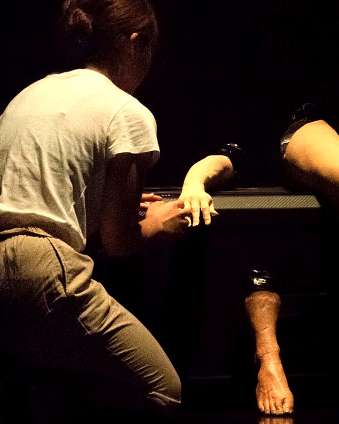 Is Any Body Home? dance theatre by Wency Lam, two dancers in low light